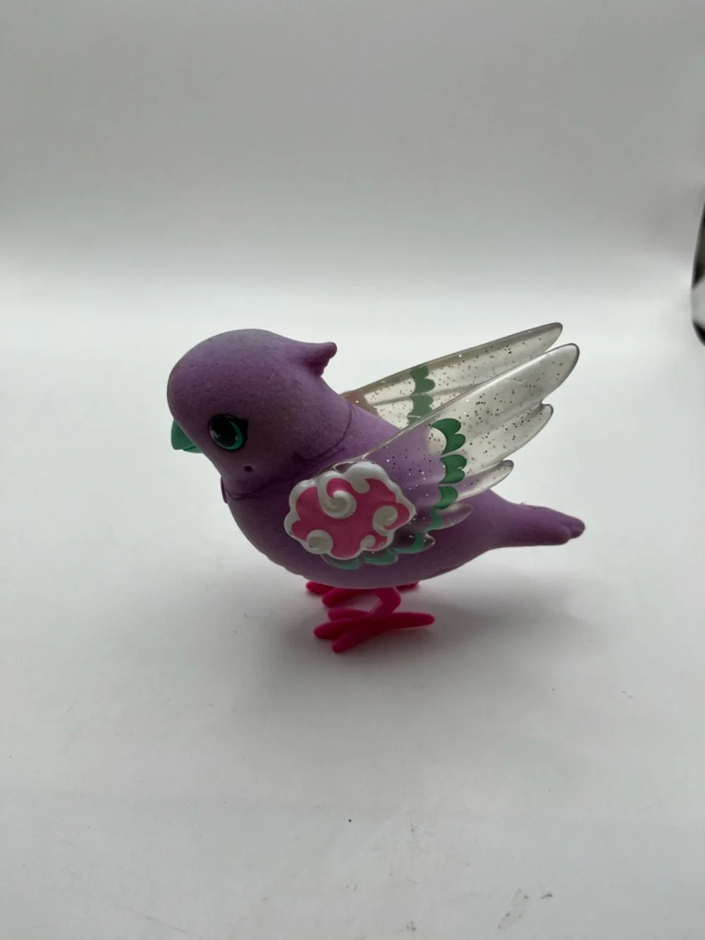 Polly Pearl Purple Decorative Pet Bird Toy with Pink Accents Lights Up and Chirp